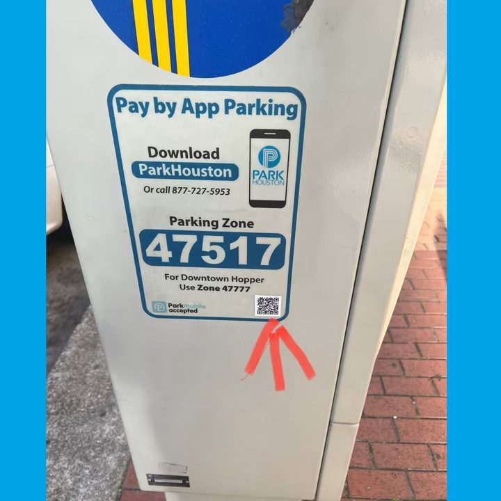 A malicious QR code pasted at a parking station.