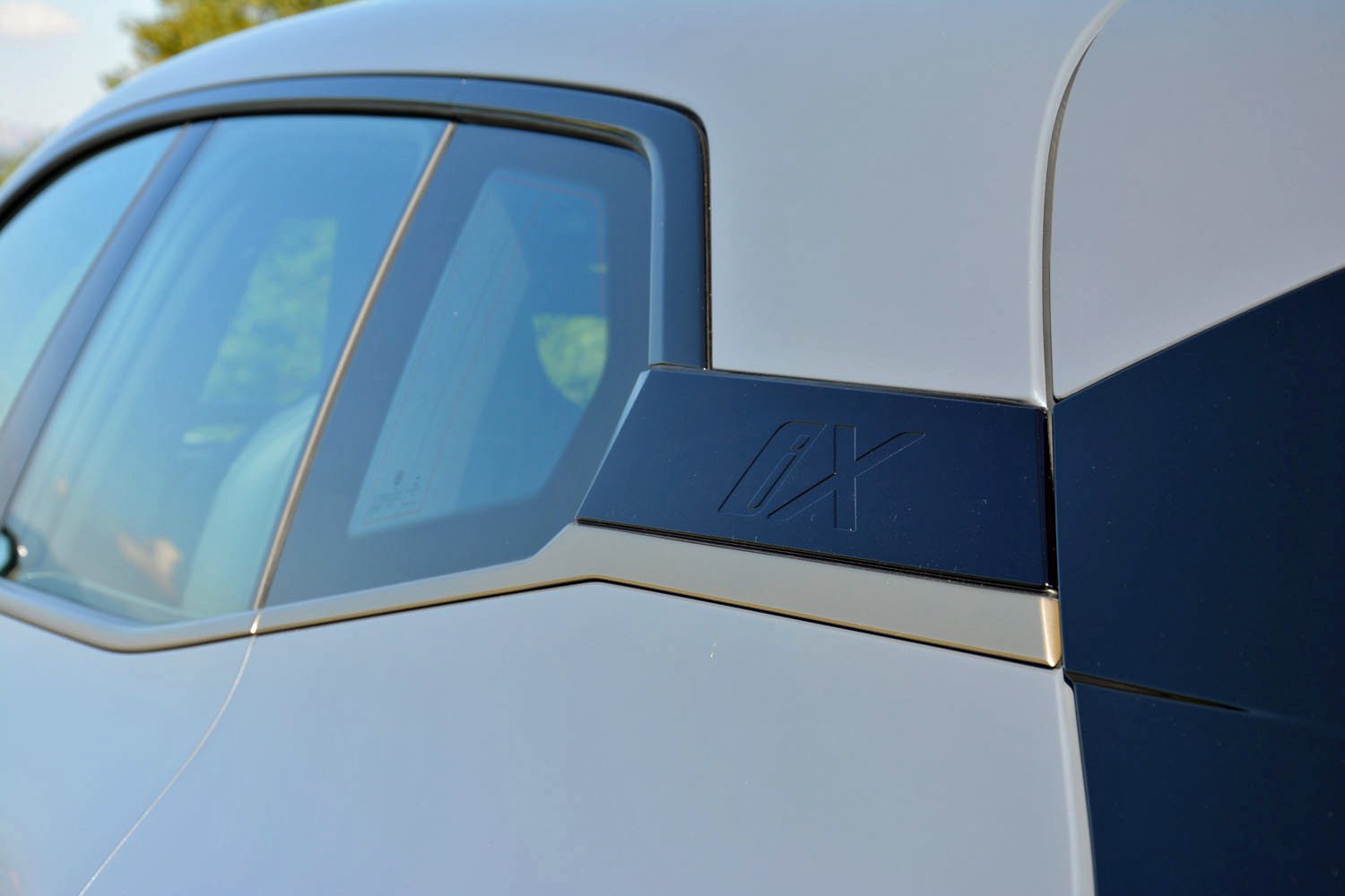 Style detail of the rear left of the 2023 BMW iX M60.