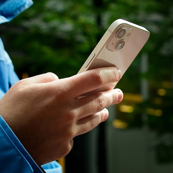 The rear panel of the iPhone 13 showing its cameras up close.