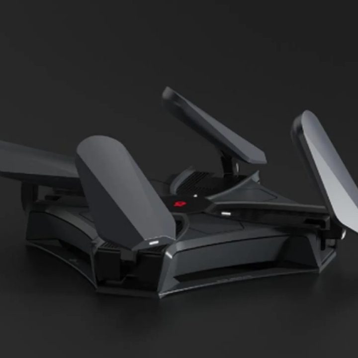 The TP-Link Archer AXE200 Omni with its antennas in motion.
