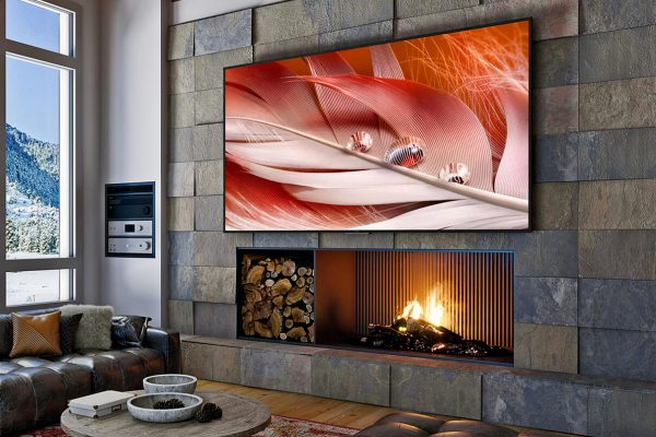 The Sony Bravia XR-X92 mounted above a fireplace.