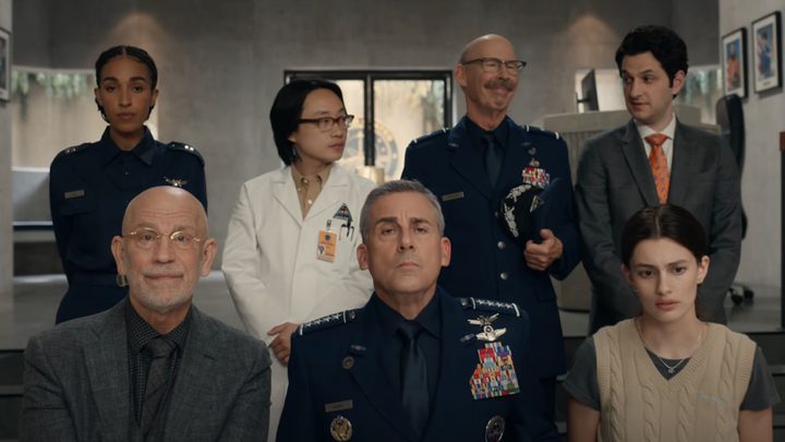The cast of Space Force looks at the camera.