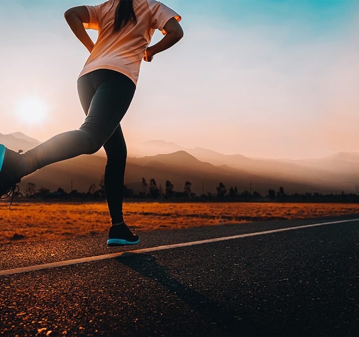 Women running sunset.