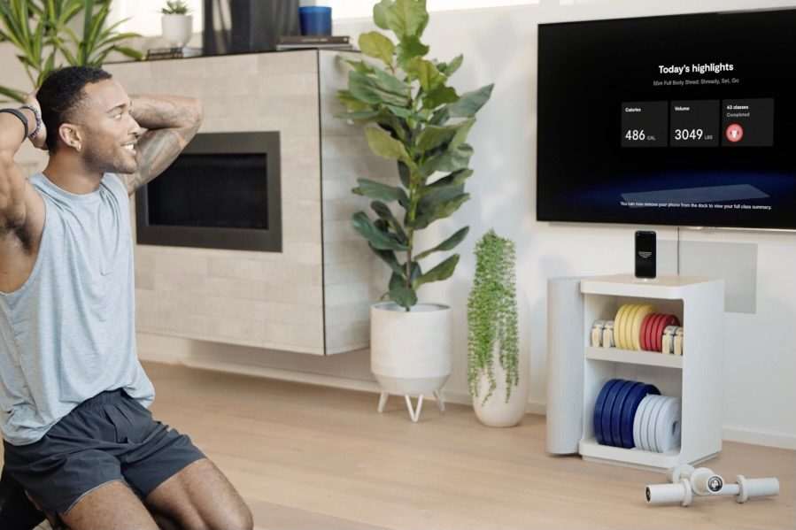 A man working out using the Tempo Move system.