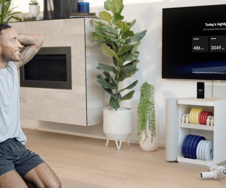 A man working out using the Tempo Move system.
