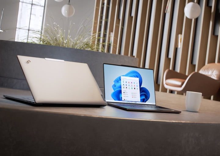 Two ThinkPad Z13 laptops, with one facing away.