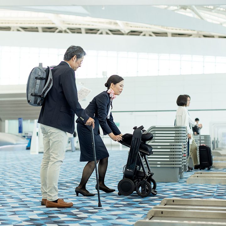 Whill folding electric wheelchair in airport.