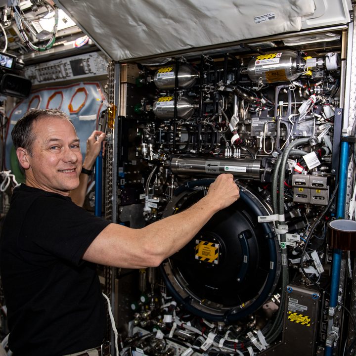 NASA astronaut and Expedition 66 Flight Engineer Thomas Marshburn configures the Combustion Integrated Rack to begin SoFIE operations.
