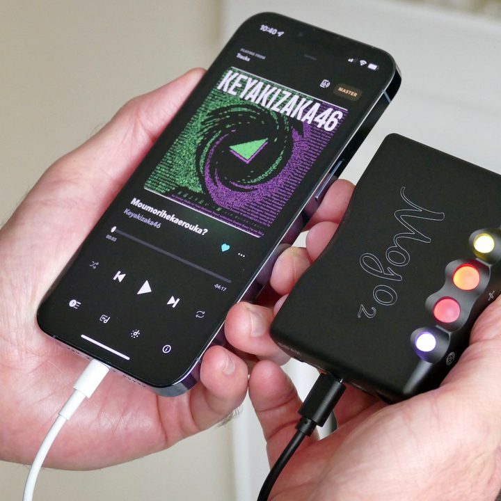 The Chord Mojo 2 next to an iPhone 13 Pro.