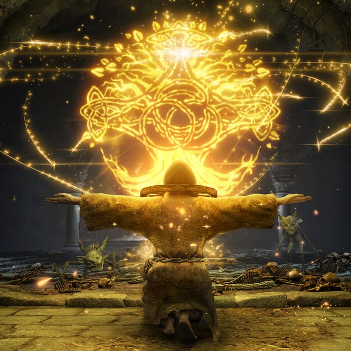 A character sits in front of a glowing, yellow orb in Elden Ring.