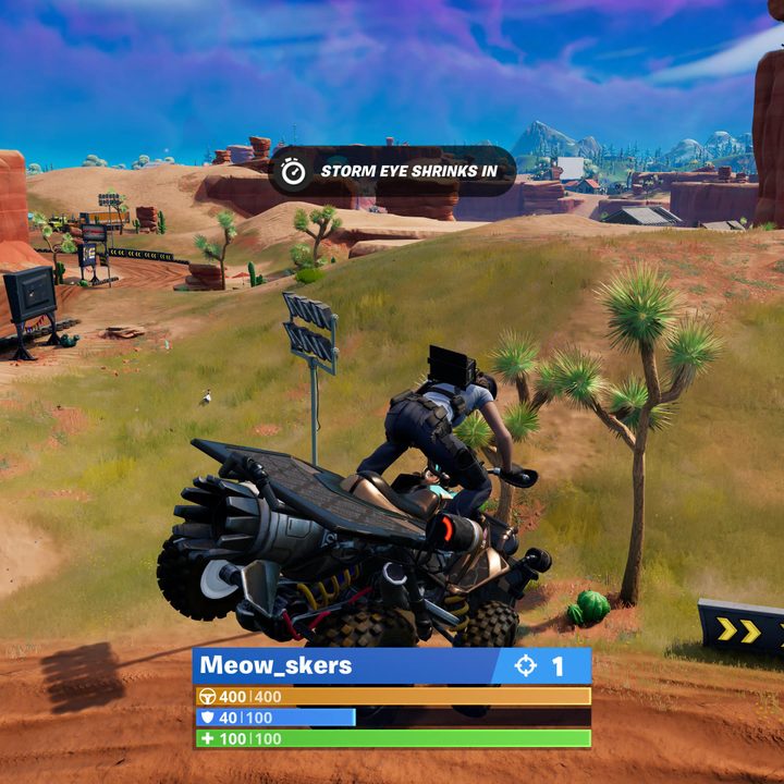 Flying through the air on a quad in Fortnite.