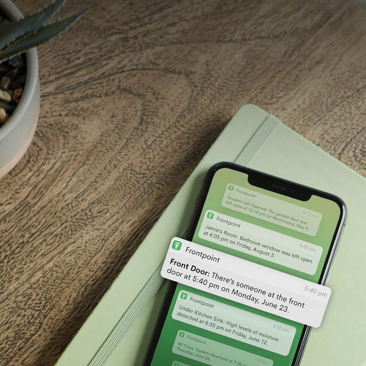 The Frontpoint app showing a list of security notifications.