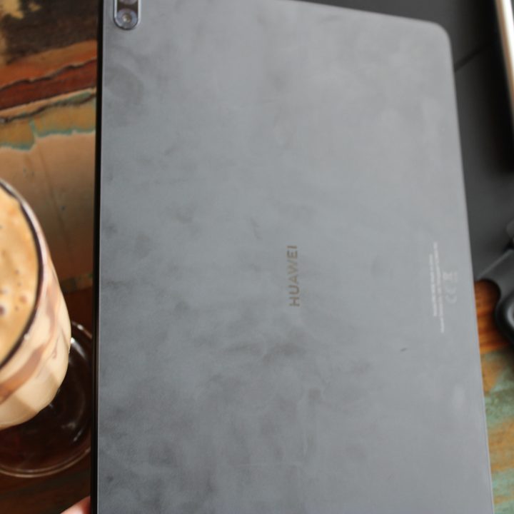 Huawei MateBook E back showing fingerprint smudges.