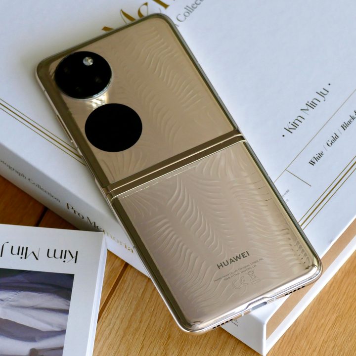 The Huawei P50 Pocket open and seen from the back.
