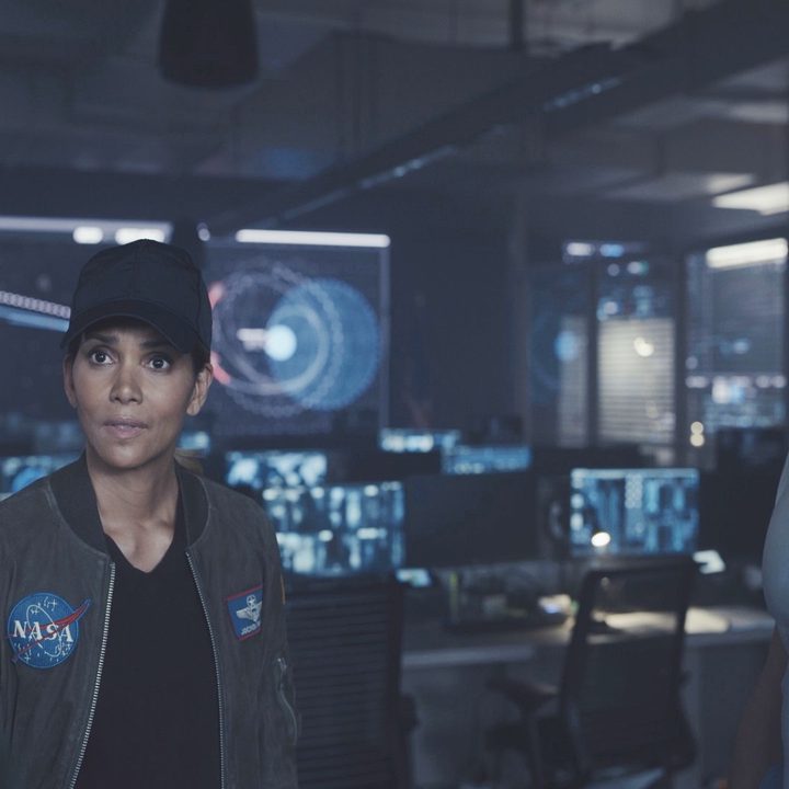 John Bradley, from left, Halle Berry, and Patrick Wilson have a discussion in Moonfall.
