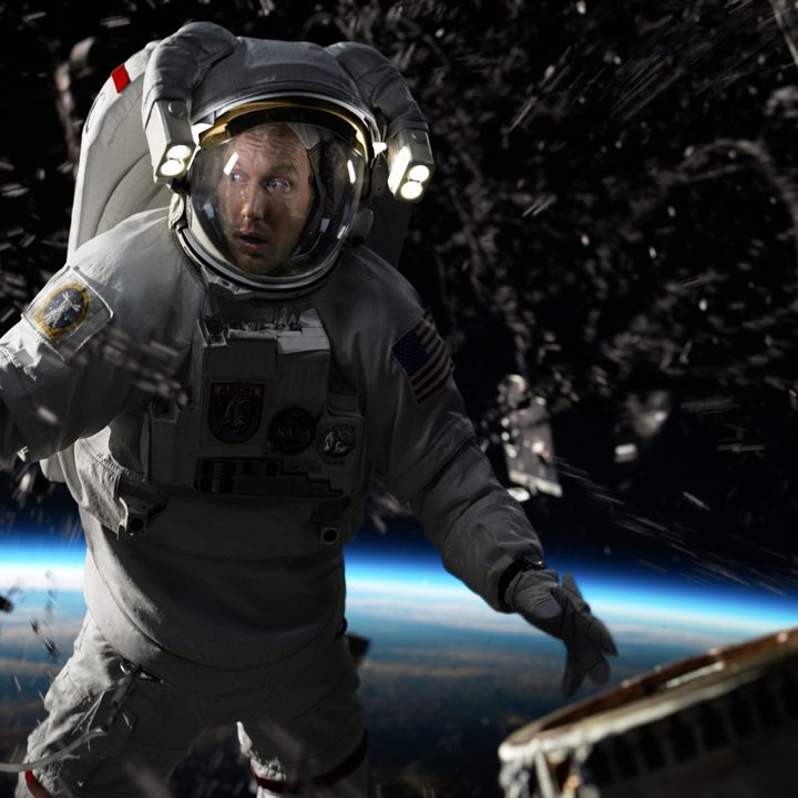 Patrick Wilson floats through space in an astronaut suit in a scene from Moonfall.