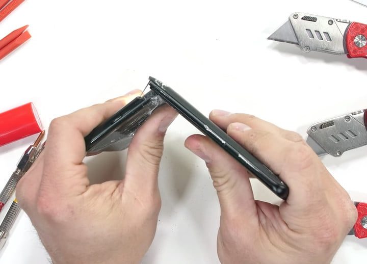 The OnePlus 10 Pro in two pieces following a rigorous bend test.
