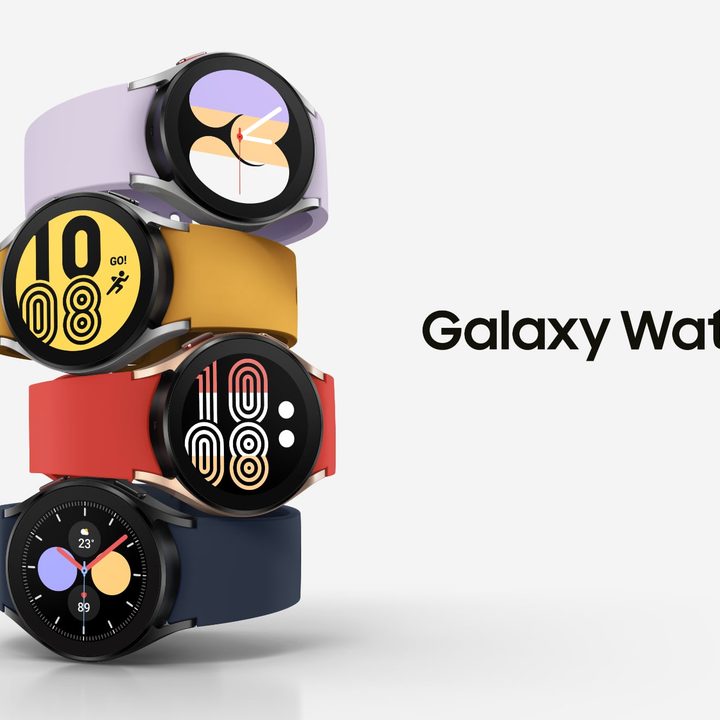 Four Samsung Galaxy Watch4 smartwatches stacked on top of each other.