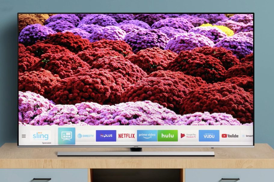 Samsung TV with the apps bar along the bottom.