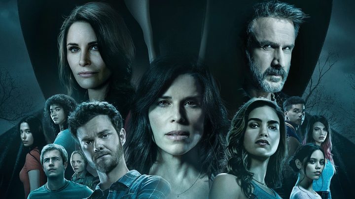 The cast of Scream looks at the camera in 2022's Scream.