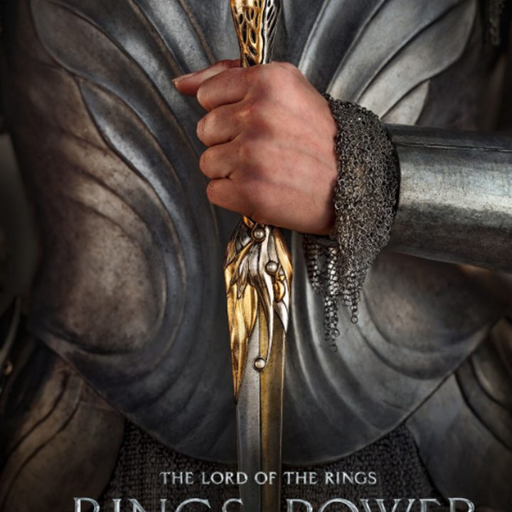 The hand of an elvish warrior in The Rings of Power.