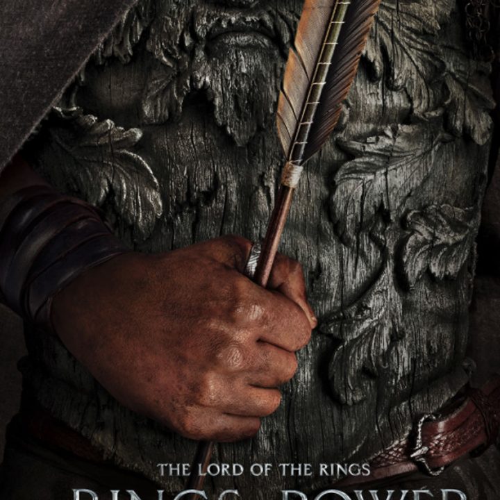 A hand holds an arrow in The Rings of Power.