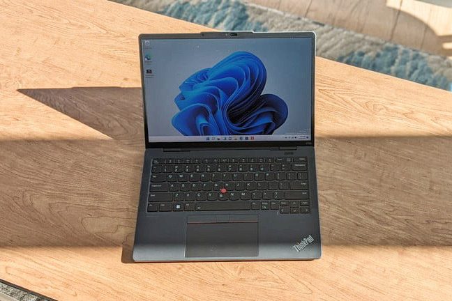ThinkPad X13s sitting on a desk.