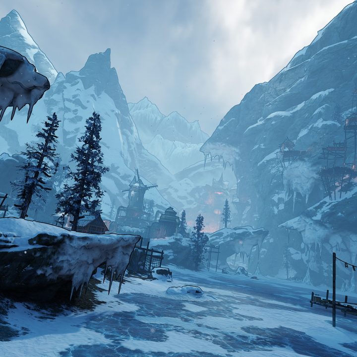A landscape shot of the Mount Craw zone, with snow-covered mountains and a frozen lake.