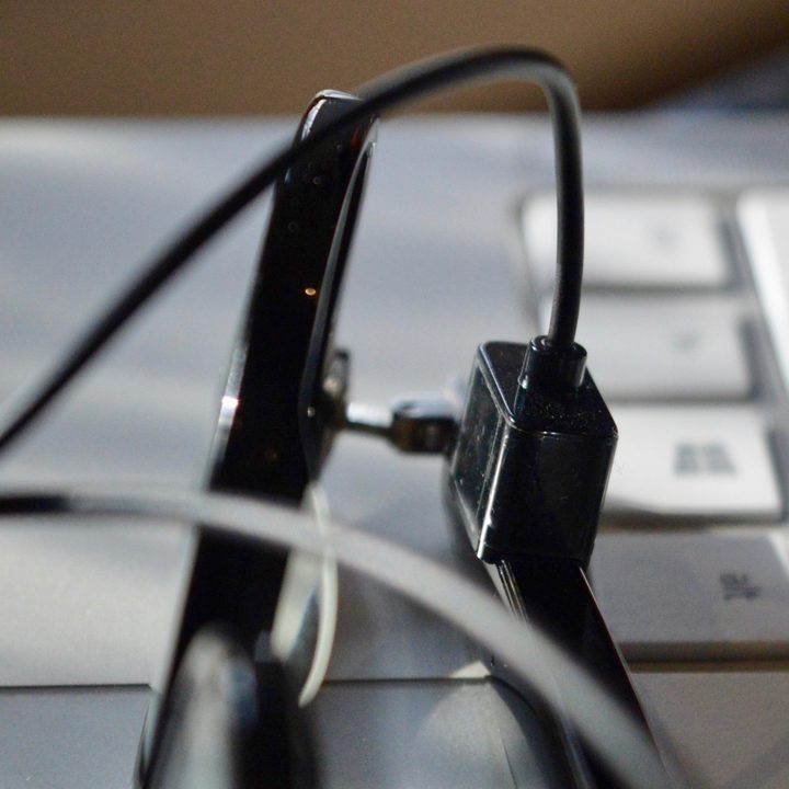 Vue Lite 2 audio glasses with charging cable.