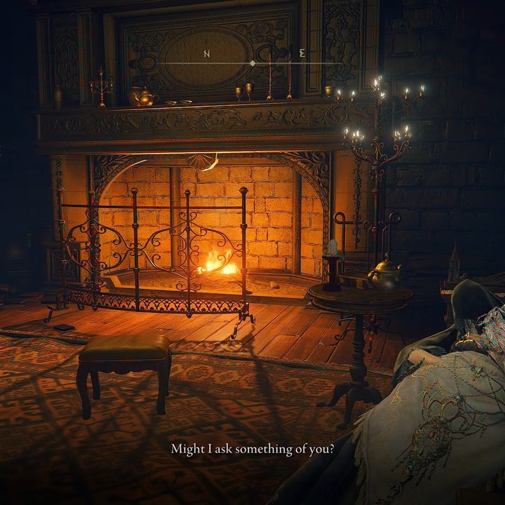 Talking to Fia by a fire.
