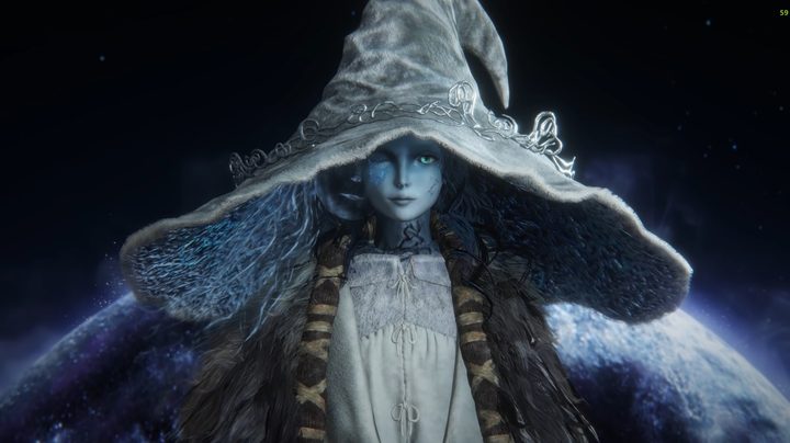A blue witch with a big hat.