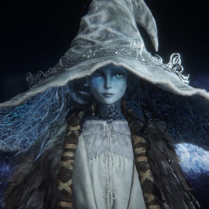 A blue witch with a big hat.