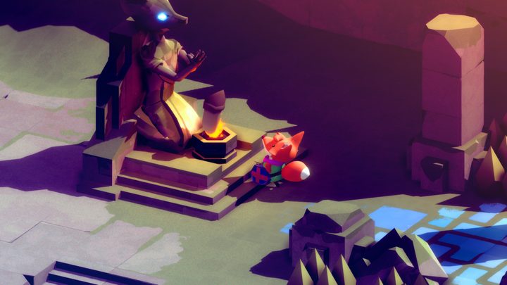 A small fox looks up at a statue in Tunic.