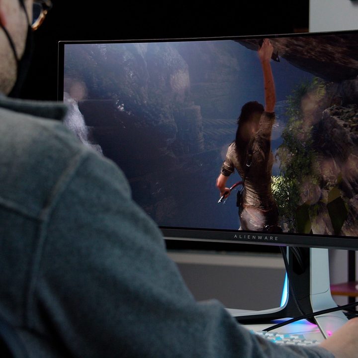 The Alienware 34 with Tomb Raider on the screen.
