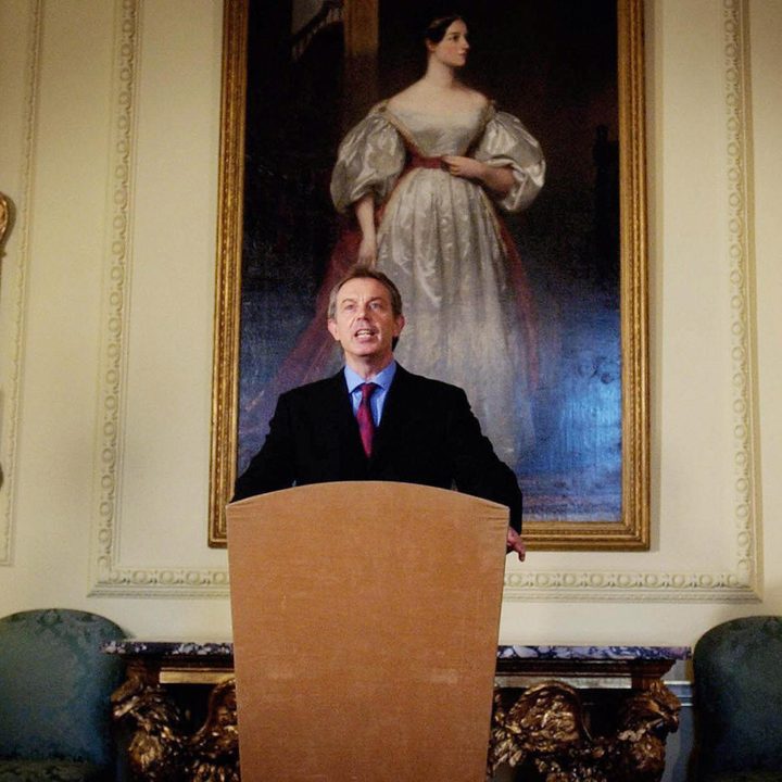 Tony Blair speaks in front of an Ada Lovelace portrait