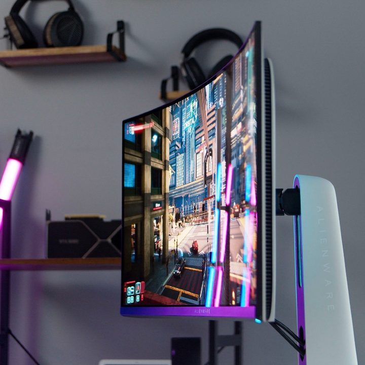 The ultrawide Alienware 34 QD-OLED against a backdrop.