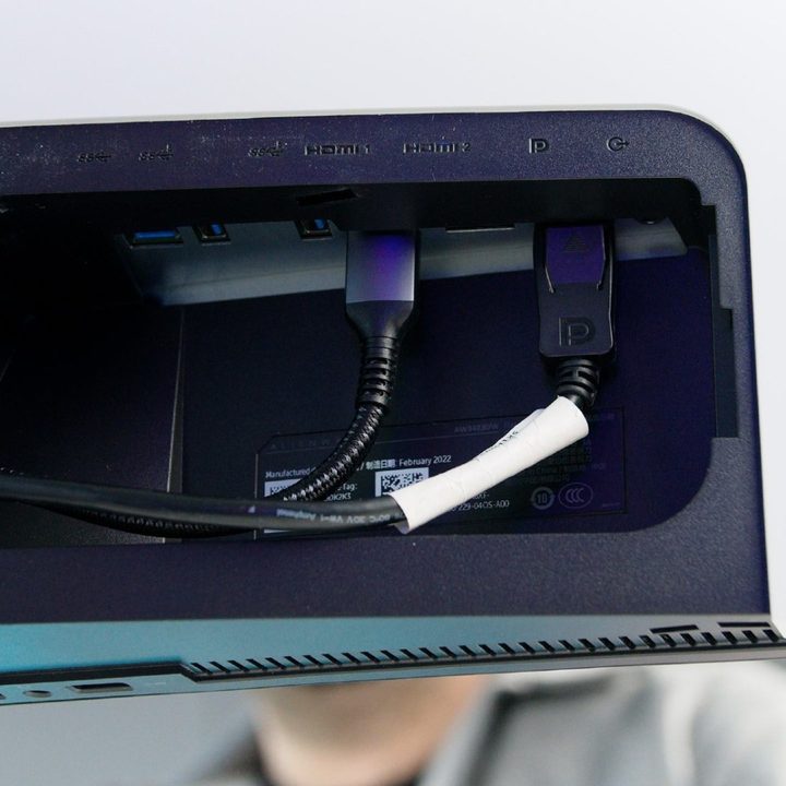 The ports on the back side of the Alienware 34 monitor.