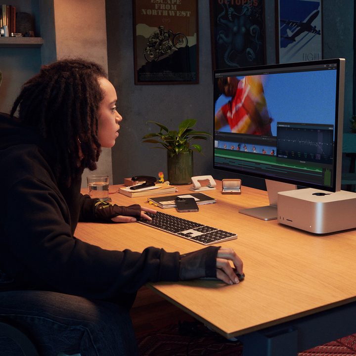 The Apple Studio Display alongside a Mac Studio computer on a desk.