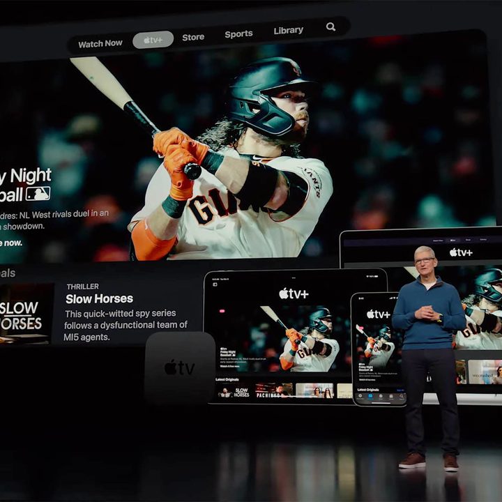 Apple CEO Tim Cook makes a presentation in front of a screen highlighting Apple TV+'s baseball offerings.