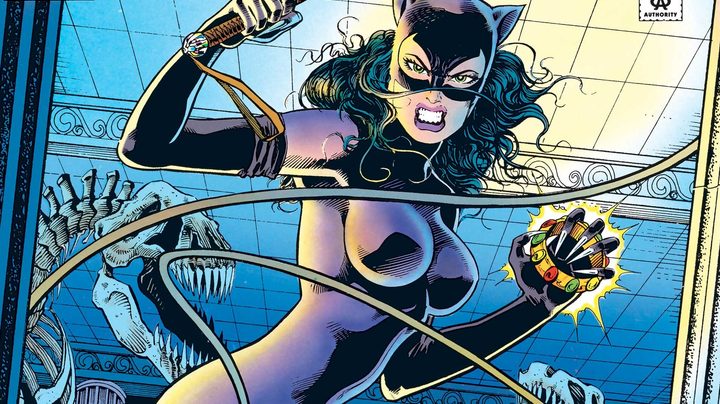 Catwomans raises her whip in a 1990s Catwoman comic book.