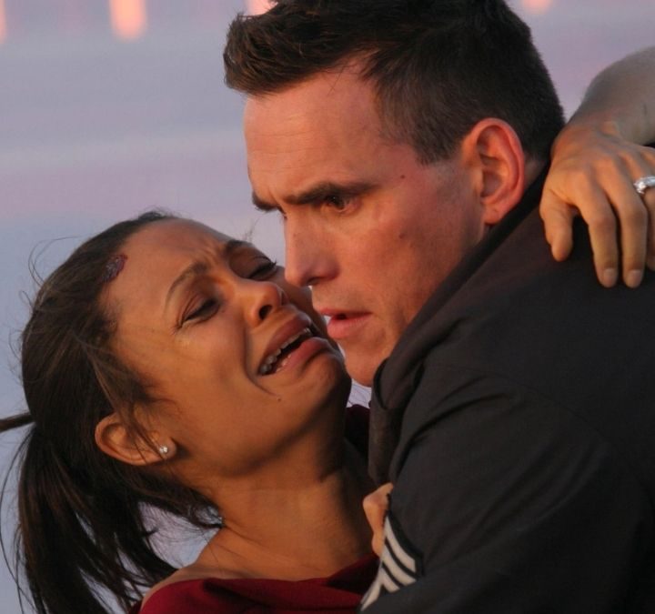 Officer John holds a crying Christine in Crash.