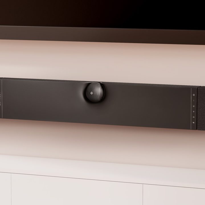 The Devialet Dione soundbar mounted on a wall.