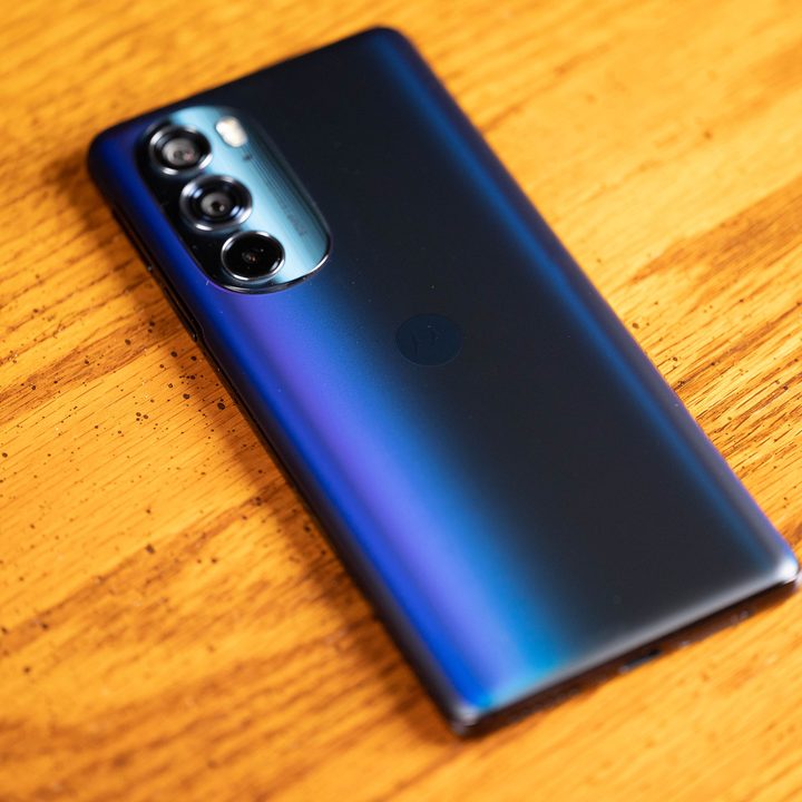 Motorola Edge+ (2022) rear view on a wood surface.