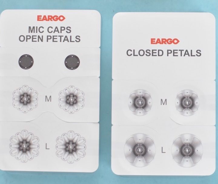 Open and closed petal eartips included with the Eargo 6 hearing aids.