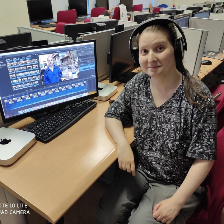 Sci-Hub creator Alexandra Elbakyan sits in front of a computer.