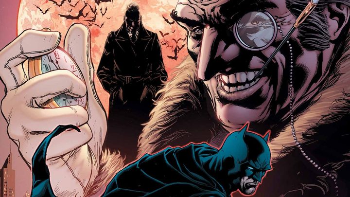 Oswald Cobblepot smiling while Batman is on his knees in DC Comics.
