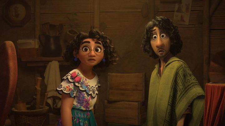 A scene from the Disney animated film Encanto, showing the family performing magic.