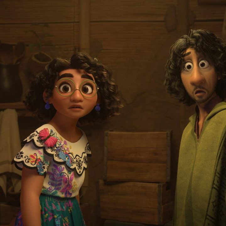 A scene from the Disney animated film Encanto, showing the family performing magic.