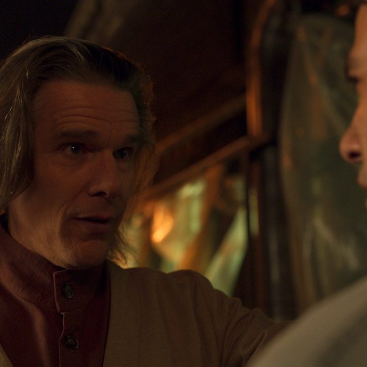 Ethan Hawke speaks to Oscar Isaac in a scene from Moon Knight.
