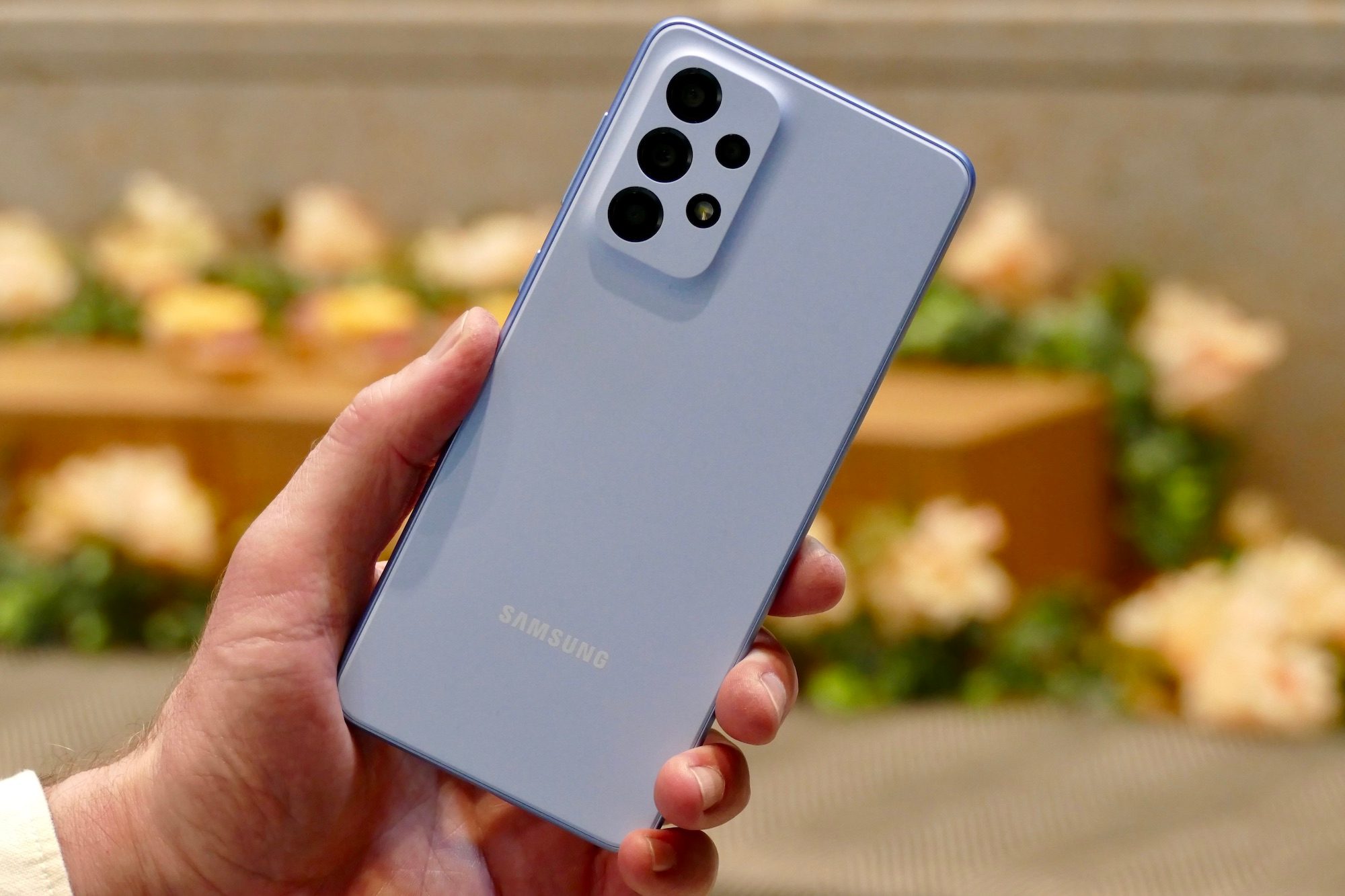 Rear view of the blue Samsung Galaxy A53 5G.